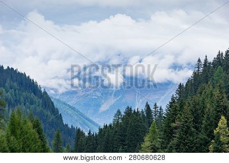 Mountains, Peaks, Lake, Everlasting Ice And Trees Landscape. Kaunertaler Gletscher Natural Environme