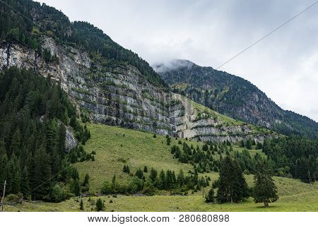 Mountains, Peaks, Lake, Everlasting Ice And Trees Landscape. Kaunertaler Gletscher Natural Environme
