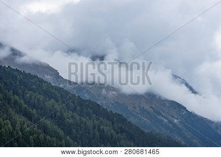 Mountains, Peaks, Lake, Everlasting Ice And Trees Landscape. Kaunertaler Gletscher Natural Environme