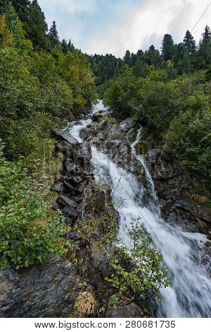 Mountain River And Trees Landscape. Kaunertaler Gletscher Natural Environment. Hiking In The Alps, K