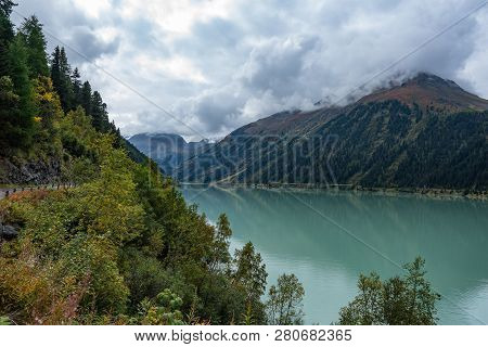 Mountain River And Trees Landscape. Kaunertaler Gletscher Natural Environment. Hiking In The Alps, K