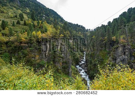 Mountain River And Trees Landscape. Kaunertaler Gletscher Natural Environment. Hiking In The Alps, K