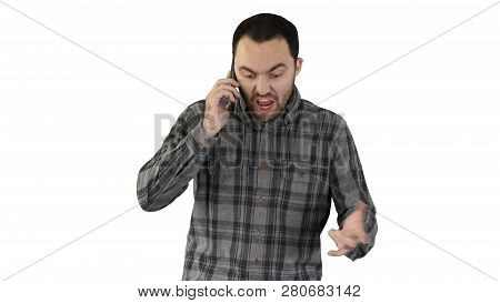 Man Angry Talking On Telephone And Walking On White Background.