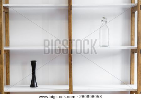 Wooden Rach With Wghite Shelves In Bright Living Room