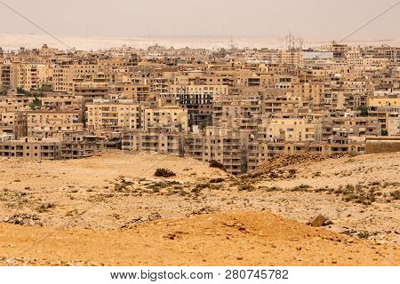 Cairo As Seen From The Pyramids Plateou In Guzeh, Egypt