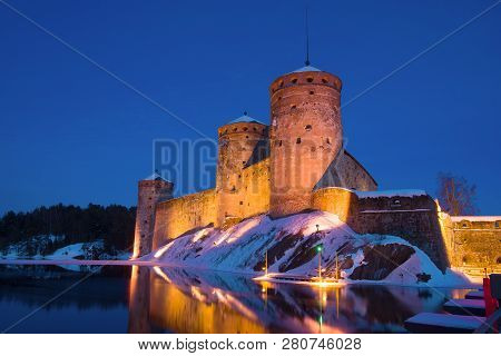 Old Fortress Olavinlinna Close-up On A Winter Evening. Savonlinna, Finland
