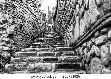 Stone Stairs And Stone Arch After Rain. The Monastery Of St. Nino At Bodbe, Georgia