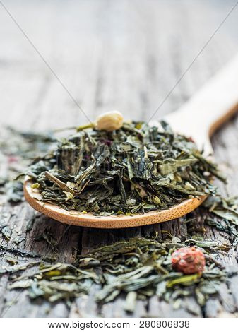 Dry Leaves Of Sencha Green Flower Tea With Cowberry Leaf, Red Currant, Jasmine, Rose Petals, Honey G