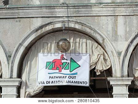 Venice, Ve, Italy - February 5, 2018: Big Road Signal With Text Pathway Out And The Text In Italian 