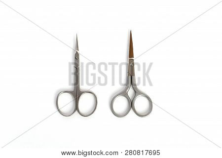2 Types Of Small Steel Nail Scissors On White Background.