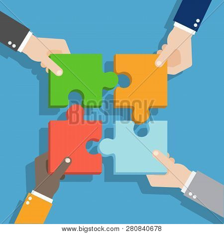 Business Concept Teamwork. Solution,success, Strategy And Puzzle. Teamwork Concept. Hands Holding Pu