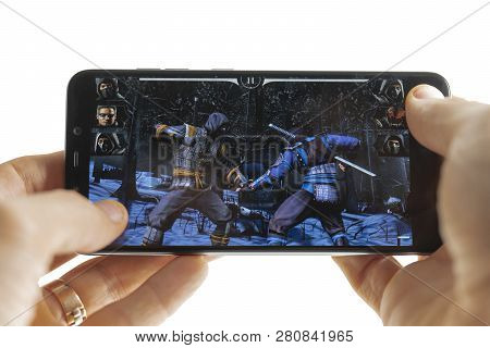 Sochi, Russia-january 27, 2018: A Man Is Playing In Minecraft Game On Smartphone