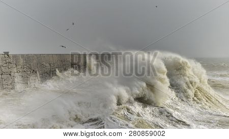 Stunning Waves Crashing Over Harbor Wall During Windy Storm At Newhaven On English Coast