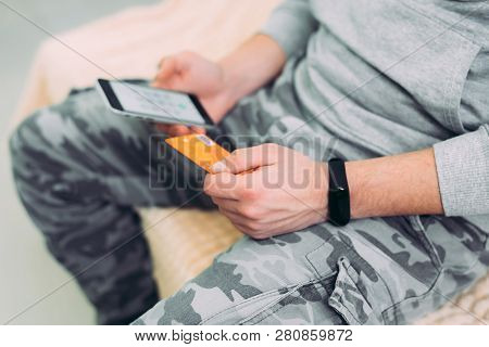 Online Payment, Hands Holding Credit Card And Using Smartphone