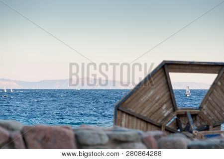 A Surfers Rides In The Gulf Of Aqaba In The Red Sea View From The Dahab Embankment Through The Missi