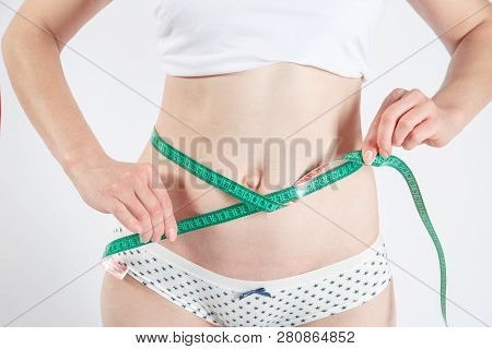 Woman Body After Weight Loss. Cropped Close Up Photo Of Fatless Slender Body Parts And Proportions W