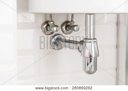 Basin Siphon Or Sink Drain In A Bathroom, Clean