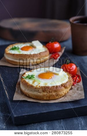 Khachapuri Modern Look On Black Wooden Cutting Board