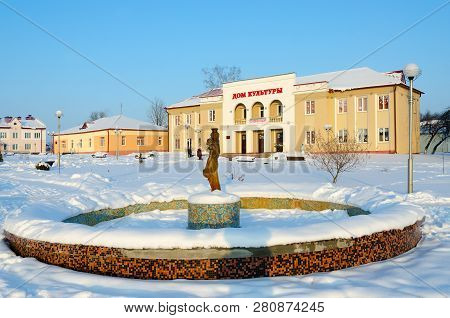 Senno, Belarus - January 10, 2019: Winter View Of Fountain On Central Square Opposite House Of Cultu
