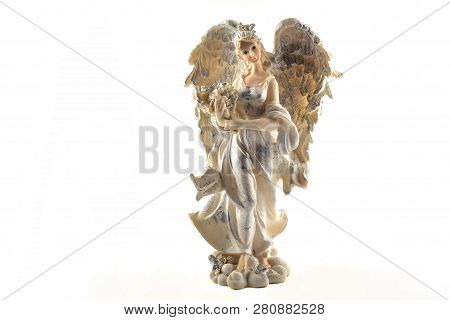 Isolated Figurine Of An Angel With Beautiful Wings