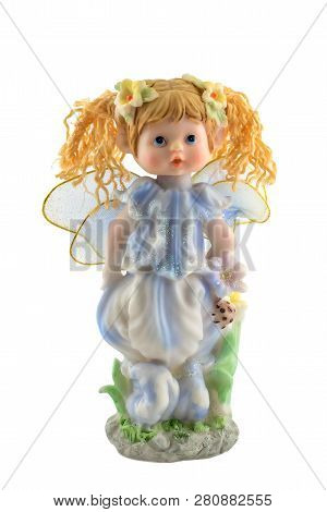 Isolated Figurine Of An Angel With Beautiful Wings