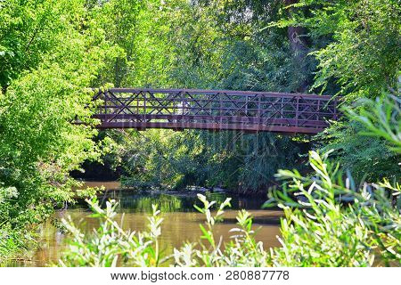 Views Of Jordan River Trail Pedestrian And Train Track Bridge With Surrounding Trees, Russian Olive,