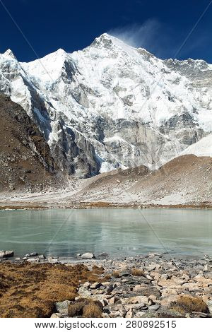 View Of Mount Cho Oyu Mirroring In Lake - Cho Oyu Base Camp - Everest Trek - Nepal Himalayas Mountai