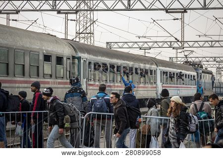 Sid, Serbia - November 14, 2015: Groups Of Refugees Boarding A Train To Cross The Croatia Serbia Bor