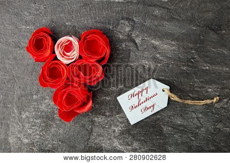 Red Roses Blossums On Slate With Label