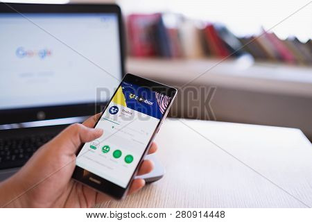 Chiang Mai, Thailand - June 03,2018: Man Holding Huawei With Dropbox On Screen. Dropbox Is A Service