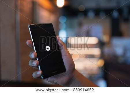 Chiang Mai, Thailand - June 09,2018: Man Holding Huawei With Uber Apps. Uber Is Smartphone App Trans