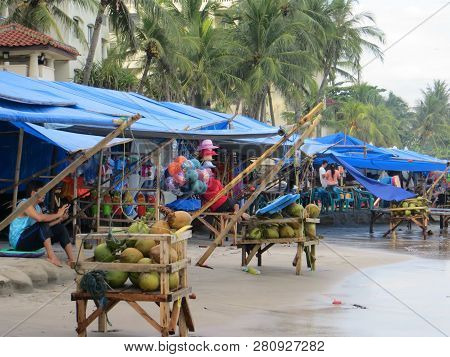 Anyer, Indonesia - June 27, 2018: Street Stalls Around The Sambolo Beach Anyer Selling Clothes And F