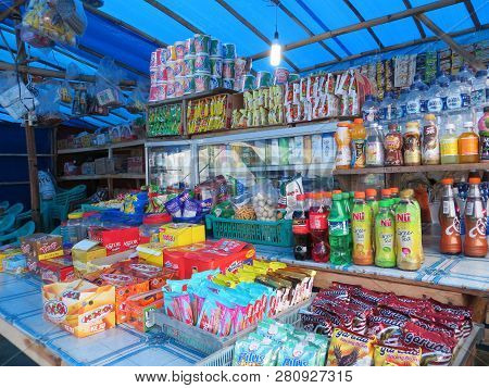 Anyer, Indonesia - June 27, 2018: Street Stalls Around The Sambolo Beach Anyer Selling Clothes And F