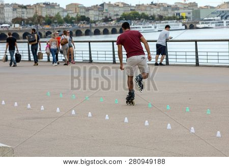 Bordeaux, France - September 9, 2018: Roller Skater Performs Acrobatics In Quai Lousi Xviii In Borde