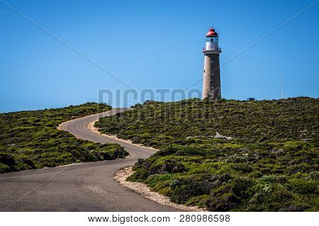 Lighthouse With Red Top And Winding Road At Cape Du Couedic On Kangaroo Island In Sa Australia