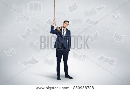 Young burnout businessman with flying documents concept