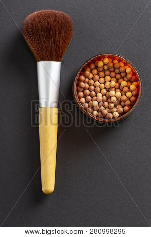 Flat Lay Of Face Powder Pearls In An Open Powder Box And A Make Up Brush. Feminine Cosmetics And Mak