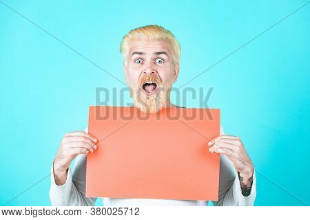 Surprised Bearded Man Holding Empty Paper. Discount Sale Or Season Sales. Business Man Holding A Bla