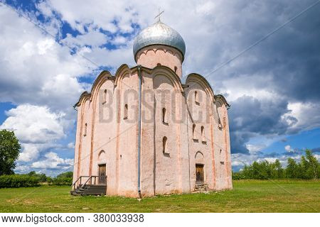 The Ancient Church Of The Savior On Nereditsa Close-up Under A Cloudy Sky. Surroundings Of Veliky No