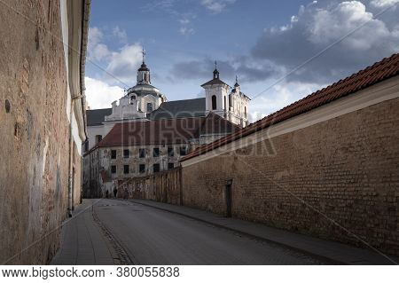 Svento Ignoto Street And The Dome Of The Church Of The Holy Spirit Of Vilnius. Lithuania