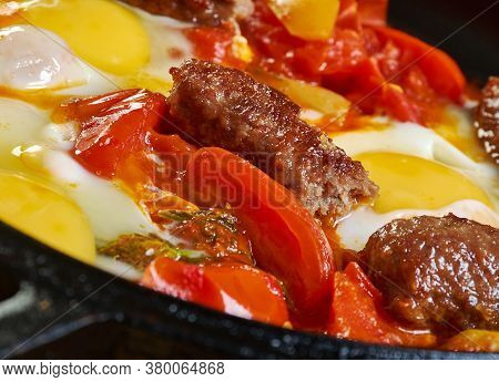 Middle Eastern Eggs With Merguez, Swap For Chipolatas Or Chorizo.