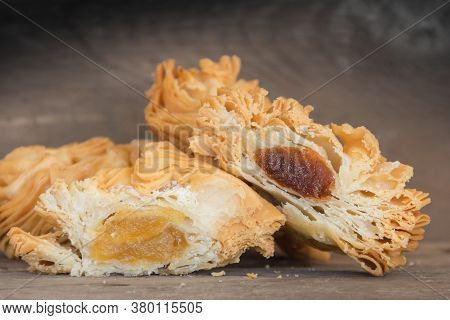 Fried Puff Pastry Cakes, Filled With Sweet Potato And Quince Paste. Traditional Argentine Dessert