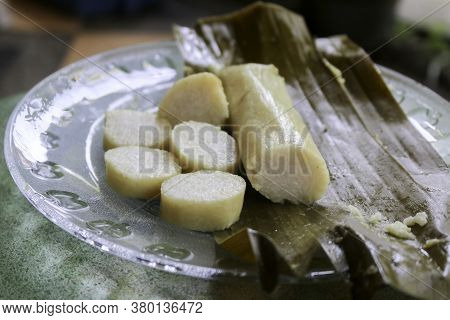Close Up Photo Of Rice Cake Or Commonly Called Lontong, Traditional Food Wrapped In Banana Leaf From