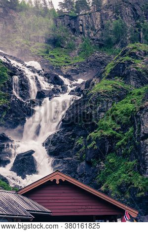 Norwegian Landscape. Waterfall Latefoss Latefossen, Odda Hordaland County In Norway. National Touris