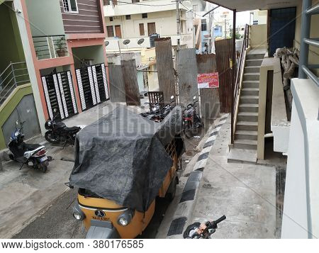 Road View Of Corona Virus Or Covid 19 Containment Zone Closed Road By Old Iron Sheets With Notice Pa