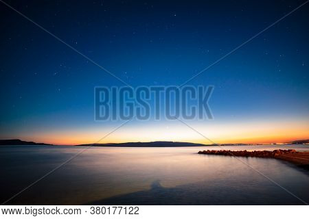 Sunset In Front Of The Port Of Senj