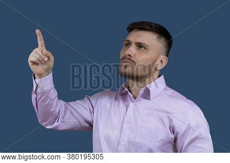Nice Man Points Up. The Man Is Pointing At Something.