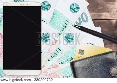 100 Czech Korun Bills And Smartphone With Purse And Credit Card. E-payments Or E-commerce Concept. O