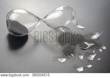 Broken Hourglass. Waste Of Time. End Of Opportunity. Stop Measuring Hours. Shards Of Glass. Shattere