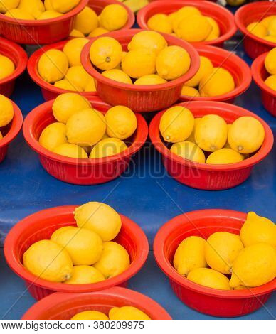 Lemons  Citrus Fruits On A Market As Texture Or Background